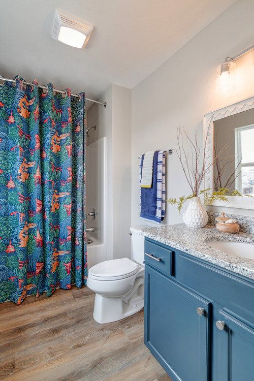 Navy Chic: Navy-Blue Cabinets with Colorful Bathroom Curtain Inspirations
