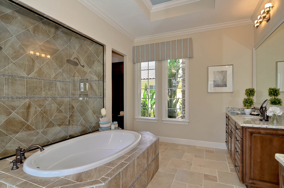 Design ideas for a mediterranean ensuite bathroom in Tampa with raised-panel cabinets, dark wood cabinets, a built-in bath, a double shower, a two-piece toilet, beige tiles, ceramic tiles, beige walls, travertine flooring, a submerged sink and granite worktops.