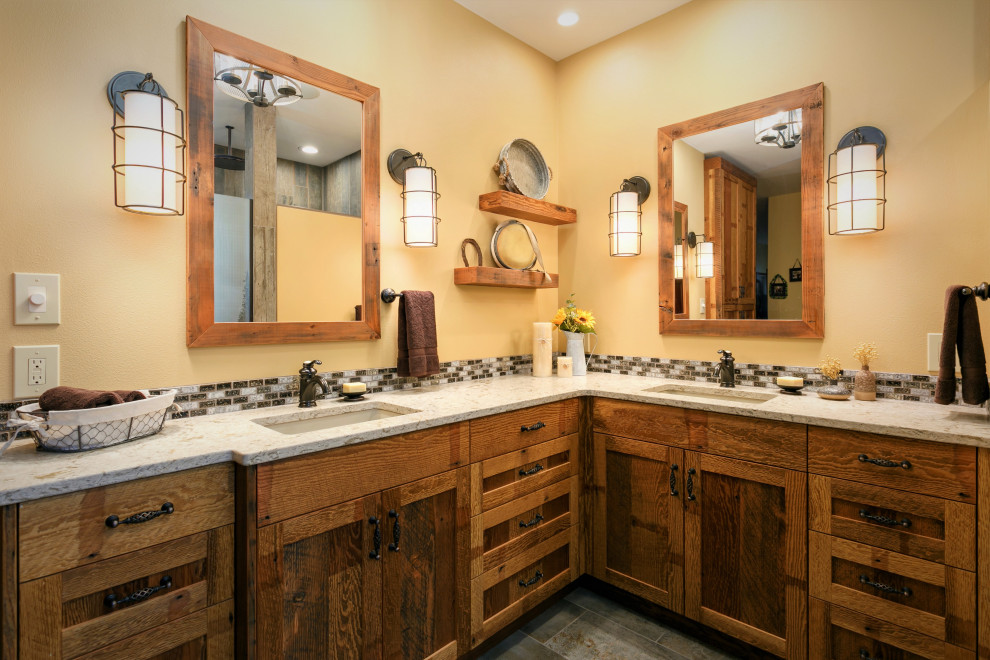 Design ideas for a medium sized rustic ensuite bathroom in Seattle with shaker cabinets, medium wood cabinets, a built-in shower, yellow tiles, glass tiles, yellow walls, porcelain flooring, engineered stone worktops, grey floors, an open shower, beige worktops, a shower bench, double sinks and a built in vanity unit.