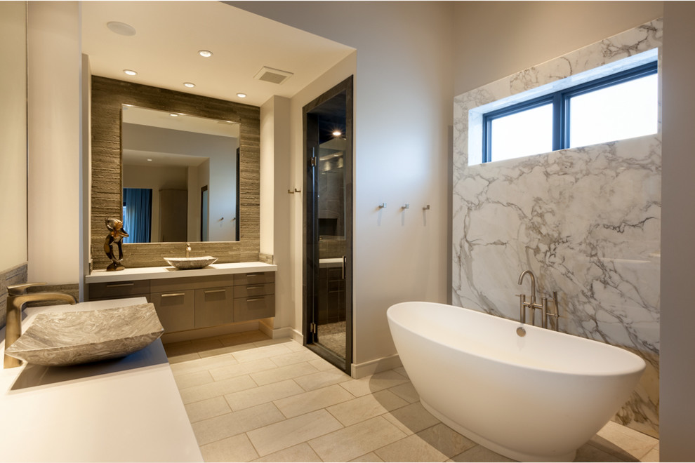 Large trendy master gray tile, white tile and marble tile slate floor and gray floor bathroom photo in Houston with flat-panel cabinets, dark wood cabinets, a two-piece toilet, gray walls, a vessel sink, quartzite countertops and a hinged shower door