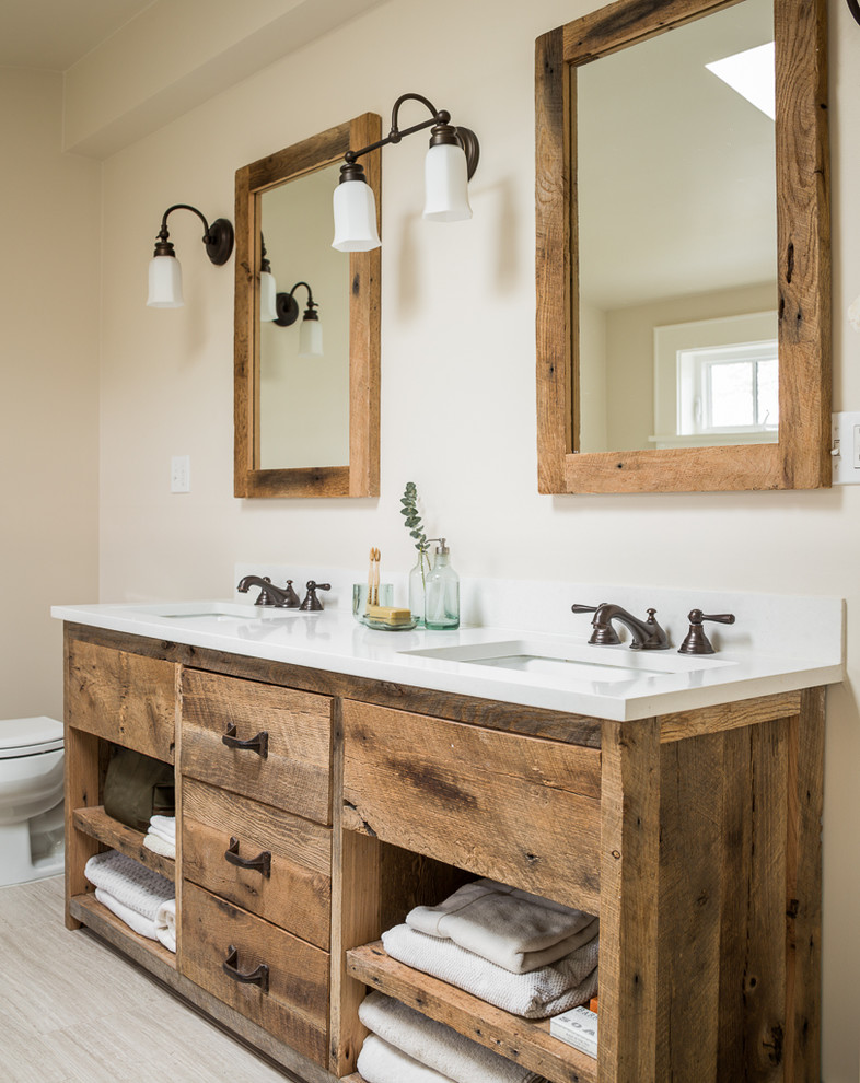 Photo of a medium sized rustic ensuite bathroom in Seattle with flat-panel cabinets, distressed cabinets, a submerged sink, engineered stone worktops and white worktops.
