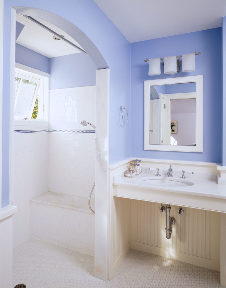 Bathroom - mid-sized country 3/4 blue tile, white tile and subway tile mosaic tile floor and white floor bathroom idea in DC Metro with blue walls, a wall-mount sink and open cabinets