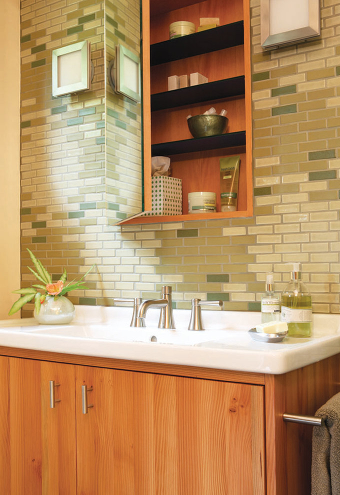 Corner shower - mid-sized contemporary 3/4 brown tile, green tile and matchstick tile slate floor corner shower idea in San Francisco with flat-panel cabinets, medium tone wood cabinets, a two-piece toilet, green walls and a drop-in sink