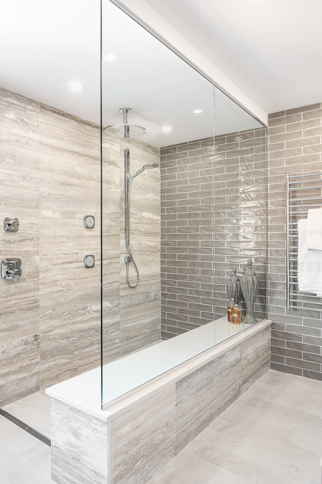 Large master gray tile freestanding bathtub photo in Ottawa with white cabinets, gray walls and shaker cabinets