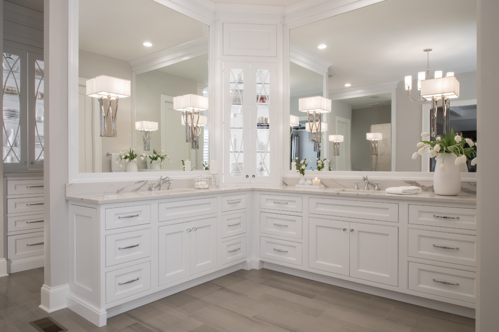 Inspiration for an expansive classic ensuite bathroom in St Louis with beaded cabinets, white cabinets, a freestanding bath, a walk-in shower, a two-piece toilet, medium hardwood flooring, a submerged sink, engineered stone worktops, brown floors and white worktops.