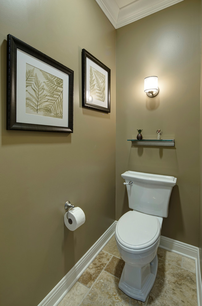 Large transitional beige tile travertine floor powder room photo in Chicago with an undermount sink, furniture-like cabinets, dark wood cabinets, marble countertops, a two-piece toilet and beige walls