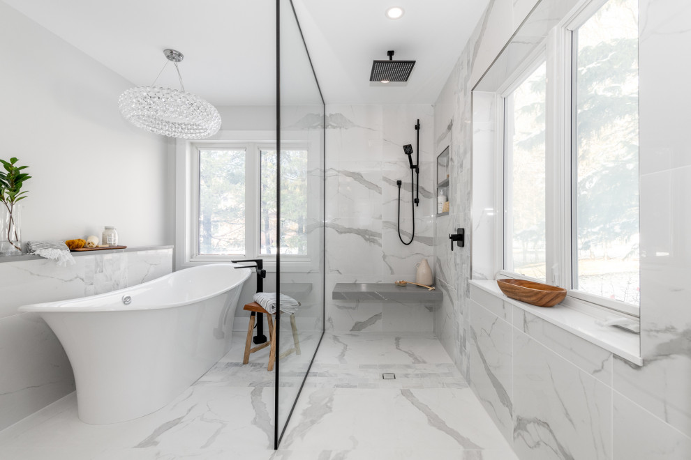 Mid-sized cottage master gray tile and marble tile marble floor, gray floor and double-sink bathroom photo in Ottawa with recessed-panel cabinets, gray cabinets, a two-piece toilet, gray walls, an undermount sink, quartz countertops, gray countertops and a built-in vanity