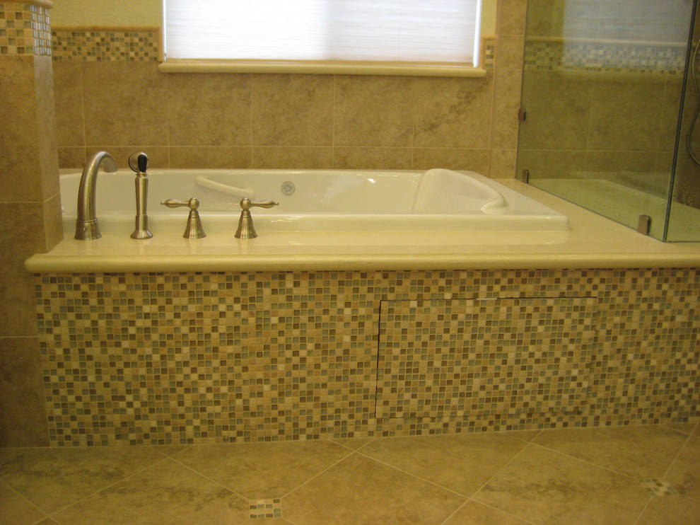 Example of a mid-sized transitional master green tile and porcelain tile porcelain tile corner shower design in San Francisco with an undermount sink, raised-panel cabinets, white cabinets, quartz countertops, a hot tub, a two-piece toilet and beige walls