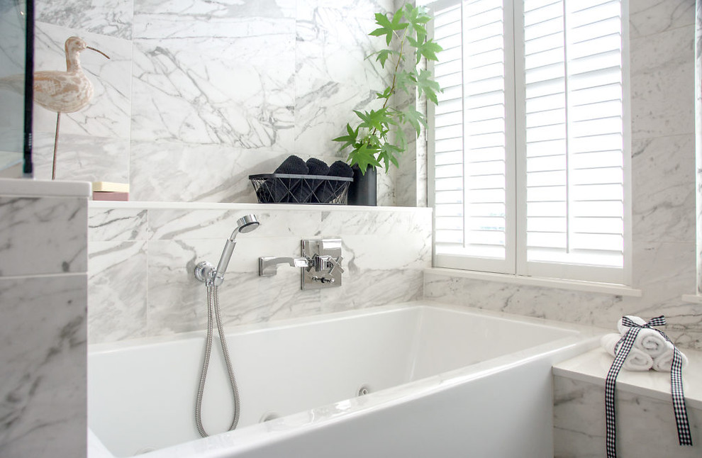 Inspiration for a large contemporary ensuite wet room bathroom in Seattle with recessed-panel cabinets, dark wood cabinets, an alcove bath, grey walls, marble flooring, a submerged sink, engineered stone worktops, black floors, a sliding door and white worktops.