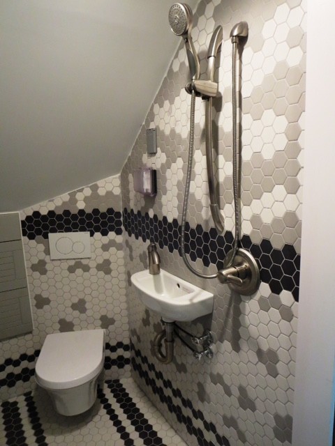 Design ideas for a small eclectic shower room bathroom in Columbus with grey cabinets, a walk-in shower, a wall mounted toilet, black and white tiles, porcelain tiles, multi-coloured walls, porcelain flooring and a wall-mounted sink.