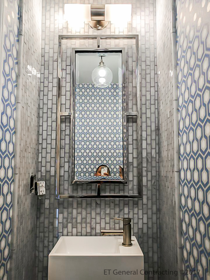 Inspiration for a mediterranean powder room remodel in New York