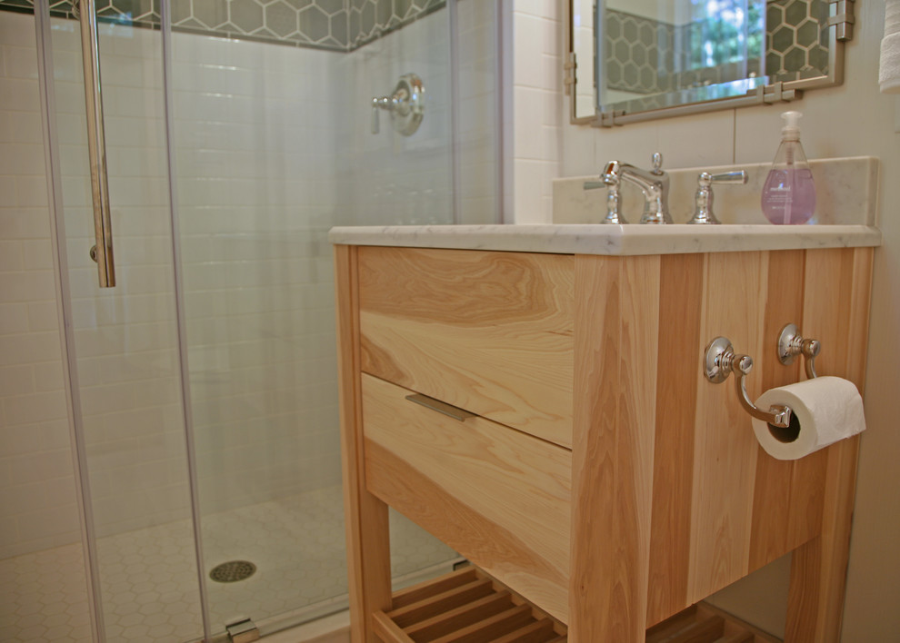 Design ideas for a medium sized urban shower room bathroom in Milwaukee with a submerged sink, flat-panel cabinets, light wood cabinets, a walk-in shower, a one-piece toilet, white tiles, ceramic tiles, white walls and ceramic flooring.