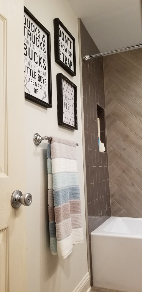 Example of a small urban kids' gray tile and porcelain tile bathroom design in Other with white cabinets, white walls, an undermount sink, quartzite countertops and white countertops