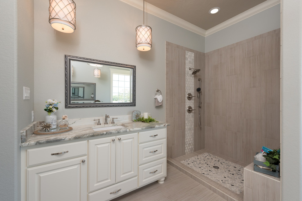 Inspiration for a mid-sized craftsman master beige tile porcelain tile and beige floor bathroom remodel in Other with raised-panel cabinets, white cabinets, a two-piece toilet, blue walls, an undermount sink, granite countertops, a hinged shower door and gray countertops