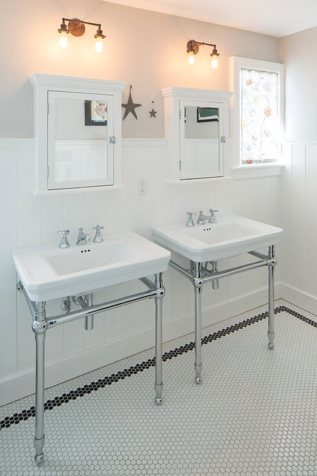 Photo of a medium sized traditional ensuite bathroom in Toronto with recessed-panel cabinets, black cabinets, a claw-foot bath, a walk-in shower, white tiles, ceramic tiles, grey walls, ceramic flooring, a pedestal sink and marble worktops.