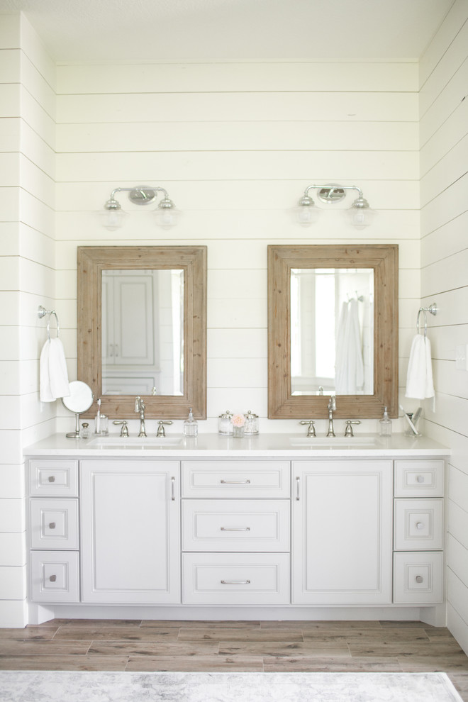Freestanding bathtub - large farmhouse master freestanding bathtub idea in Houston