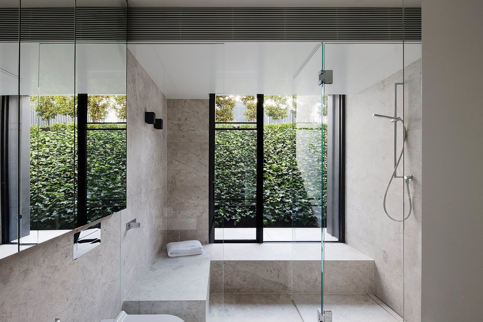 Inspiration for a modern marble floor and gray floor bathroom remodel in Melbourne with gray walls