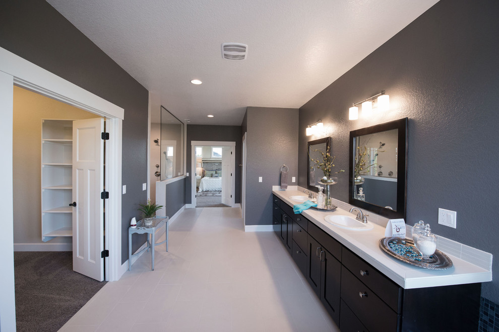 Bathroom - large traditional master white tile and porcelain tile porcelain tile bathroom idea in Portland with shaker cabinets, dark wood cabinets, a two-piece toilet, gray walls, a drop-in sink and tile countertops