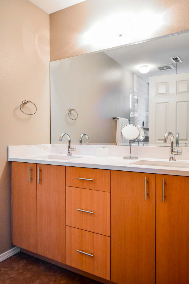 Example of a small minimalist 3/4 white tile and subway tile cork floor, red floor and double-sink alcove shower design in Portland with flat-panel cabinets, light wood cabinets, a two-piece toilet, beige walls, an undermount sink, quartz countertops, a hinged shower door, white countertops, a niche and a built-in vanity