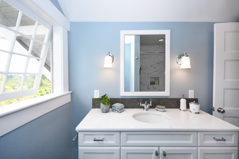 Small traditional shower room bathroom in Seattle with open cabinets, white cabinets, a built-in bath, an alcove shower, a one-piece toilet, multi-coloured tiles, marble tiles, blue walls, porcelain flooring, an integrated sink, quartz worktops, grey floors, a shower curtain and white worktops.