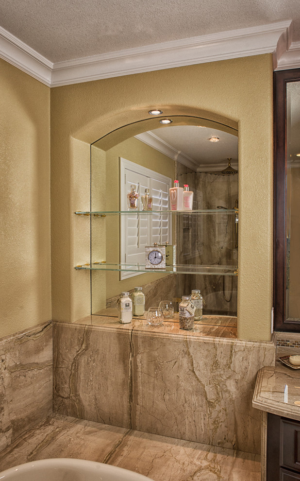 Exemple d'une salle de bain principale chic en bois foncé avec un placard en trompe-l'oeil, un plan de toilette en marbre, une baignoire posée, une douche d'angle, un carrelage beige, un carrelage en pâte de verre, un mur beige et un sol en marbre.