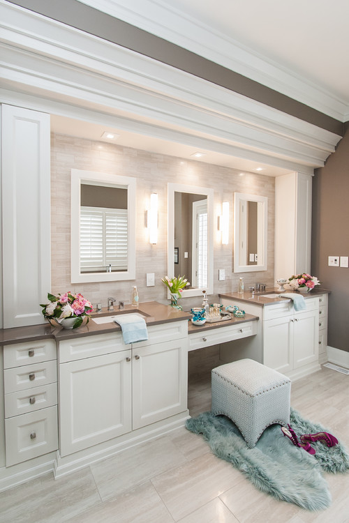 Tips to keep bathroom cabinets stylish and organized with double vanity, shaker doors, and elegant lighting