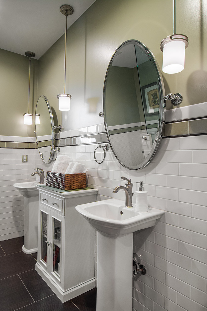 Bathroom - traditional white tile and subway tile bathroom idea in Salt Lake City with a pedestal sink and green walls