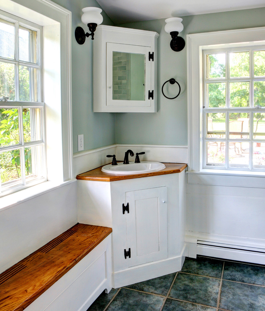 Design ideas for a rustic bathroom in Bridgeport with a built-in sink.