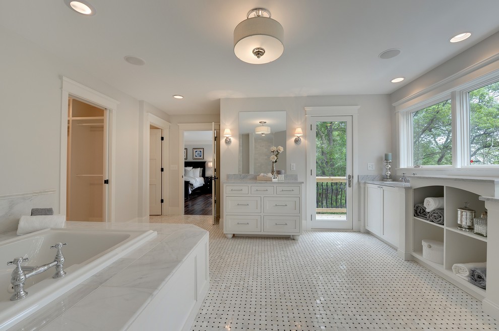 Bathroom - traditional white tile and subway tile mosaic tile floor bathroom idea in Minneapolis with an undermount sink, recessed-panel cabinets, white cabinets, marble countertops, a two-piece toilet and gray walls