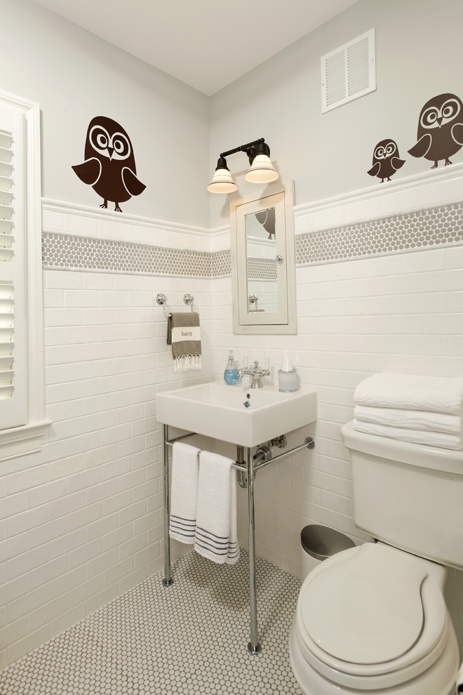 Example of a classic kids' white tile and subway tile bathroom design in DC Metro with a console sink and a two-piece toilet