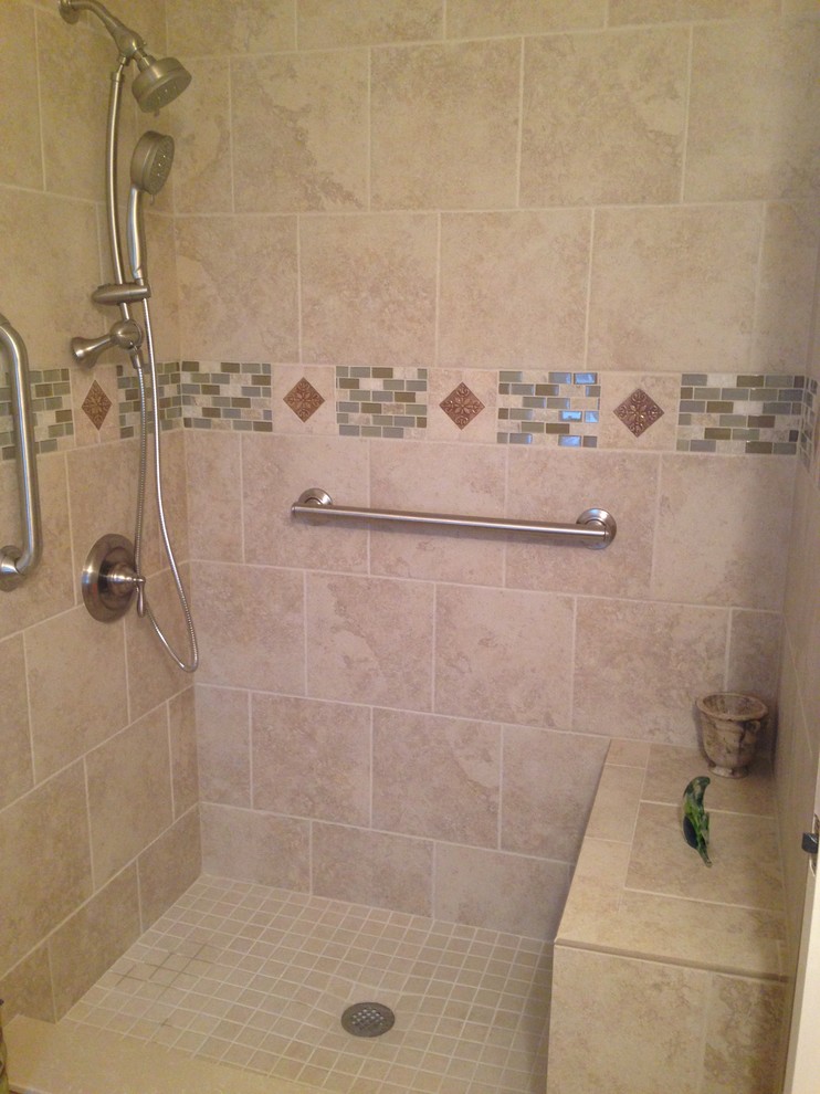 Inspiration for a small timeless master beige tile and porcelain tile porcelain tile alcove shower remodel in Orlando with yellow walls