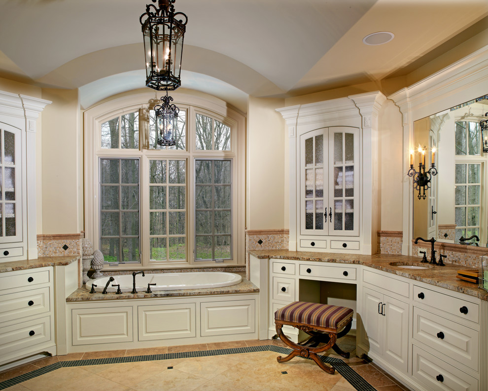Traditional bathroom in Columbus with a built-in bath.