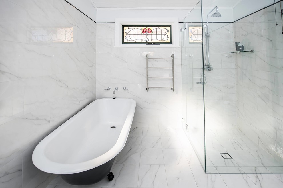 Bathroom - mid-sized traditional master white tile and marble tile marble floor, white floor and double-sink bathroom idea in Sydney with a one-piece toilet, white walls, a hinged shower door, recessed-panel cabinets, white cabinets, a drop-in sink, marble countertops, white countertops and a built-in vanity