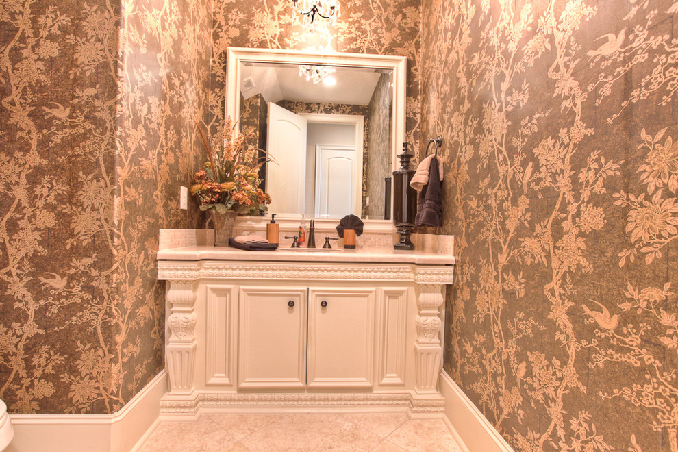 Photo of a classic bathroom in Houston with white cabinets and recessed-panel cabinets.
