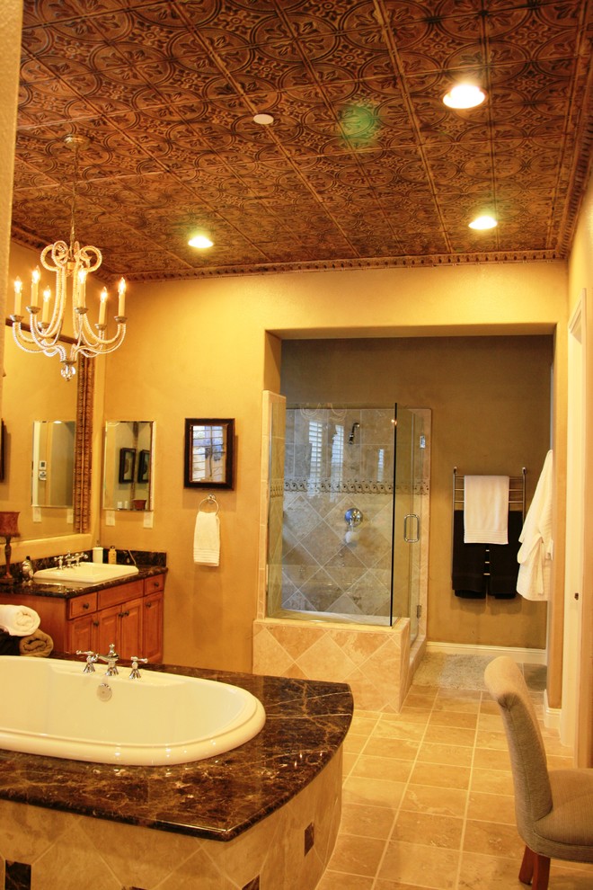 Inspiration pour une salle de bain traditionnelle en bois brun avec un lavabo posé, un placard avec porte à panneau surélevé, une baignoire posée, une douche d'angle et un carrelage beige.