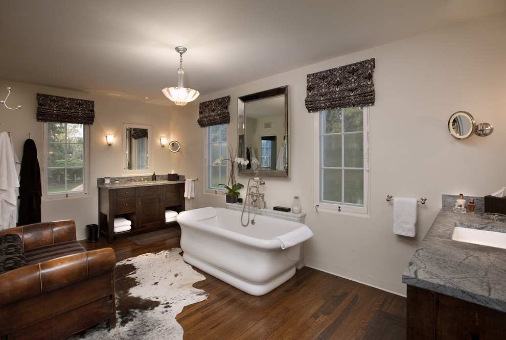 Photo of a traditional bathroom in Santa Barbara with a freestanding bath and marble worktops.