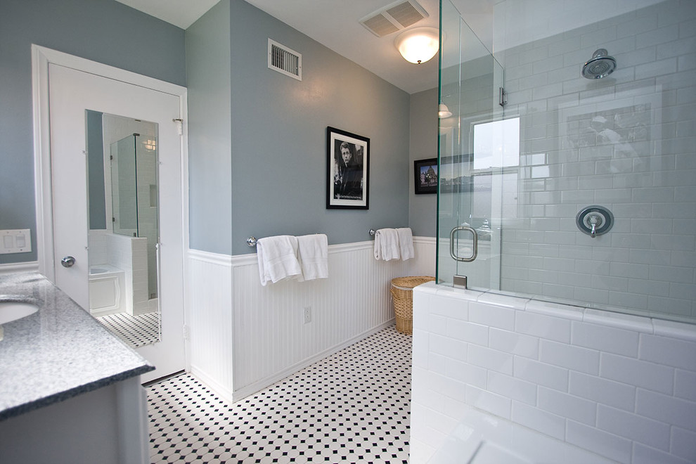 На фото: ванная комната в классическом стиле с врезной раковиной, столешницей из гранита, угловым душем, белой плиткой, плиткой кабанчик, синими стенами и полом из мозаичной плитки с