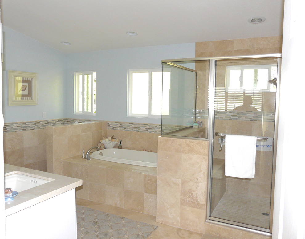 Photo of a traditional bathroom in San Diego with a submerged sink, shaker cabinets, white cabinets, marble worktops, beige tiles, mosaic tiles, blue walls and travertine flooring.