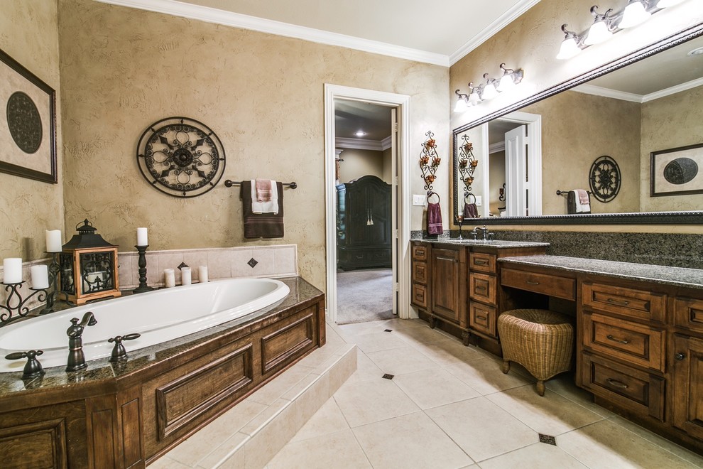 Bathroom - large traditional master beige tile and ceramic tile ceramic tile bathroom idea in Dallas with beaded inset cabinets, dark wood cabinets, a two-piece toilet, beige walls, an undermount sink and granite countertops