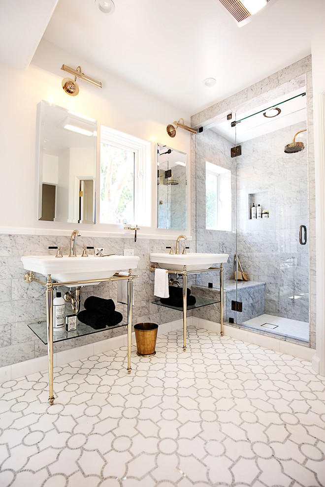 Inspiration for a mid-sized timeless master white tile and stone tile mosaic tile floor bathroom remodel in San Francisco with a one-piece toilet, white walls, a pedestal sink and solid surface countertops