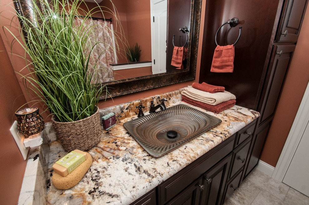 Example of a small classic kids' orange tile porcelain tile and gray floor bathroom design in Detroit with raised-panel cabinets and brown cabinets