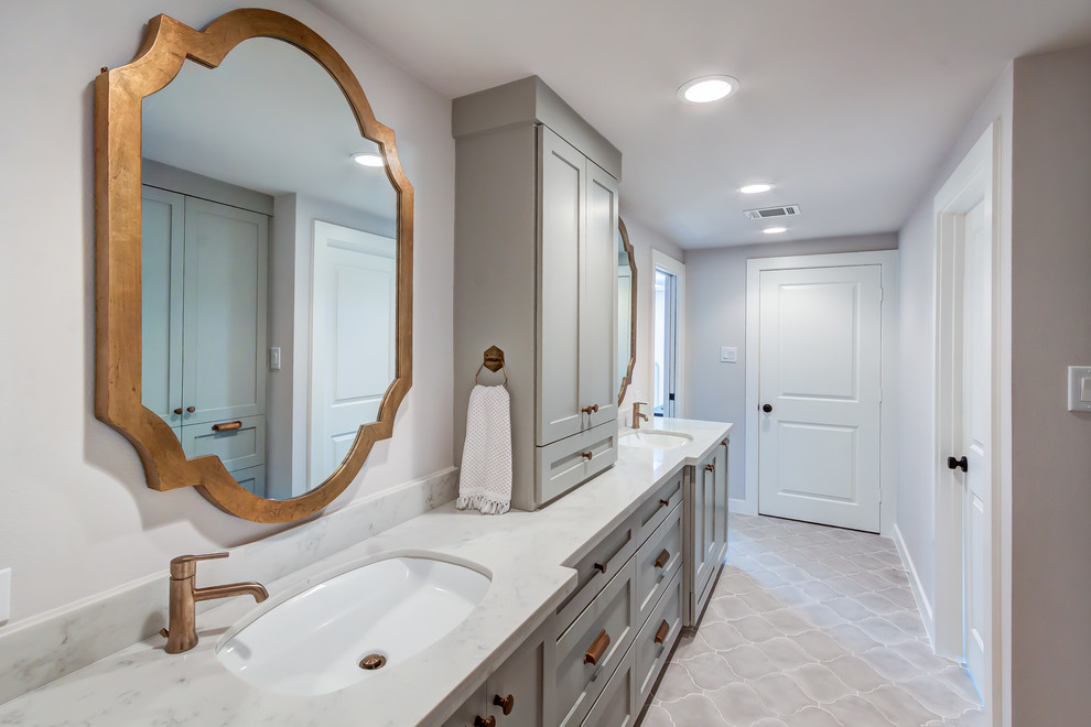 Medium sized traditional family bathroom in Houston with shaker cabinets, grey cabinets, a built-in bath, a shower/bath combination, grey tiles, porcelain tiles, grey walls, porcelain flooring, a submerged sink, engineered stone worktops, grey floors and a shower curtain.