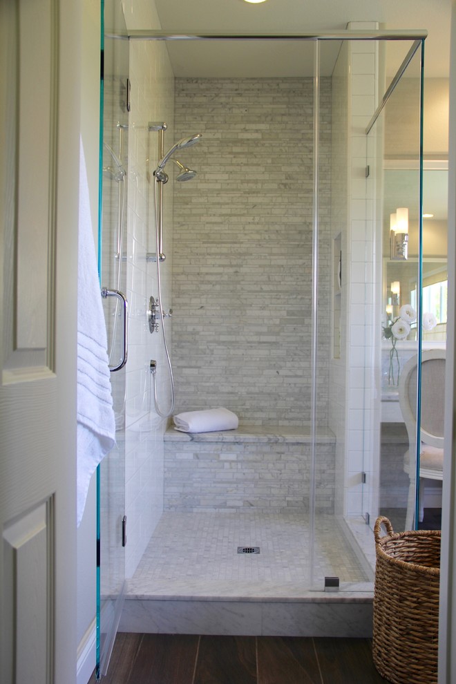Example of a large classic master gray tile and marble tile porcelain tile and brown floor bathroom design in Los Angeles with shaker cabinets, white cabinets, a one-piece toilet, gray walls, an undermount sink, marble countertops and a hinged shower door