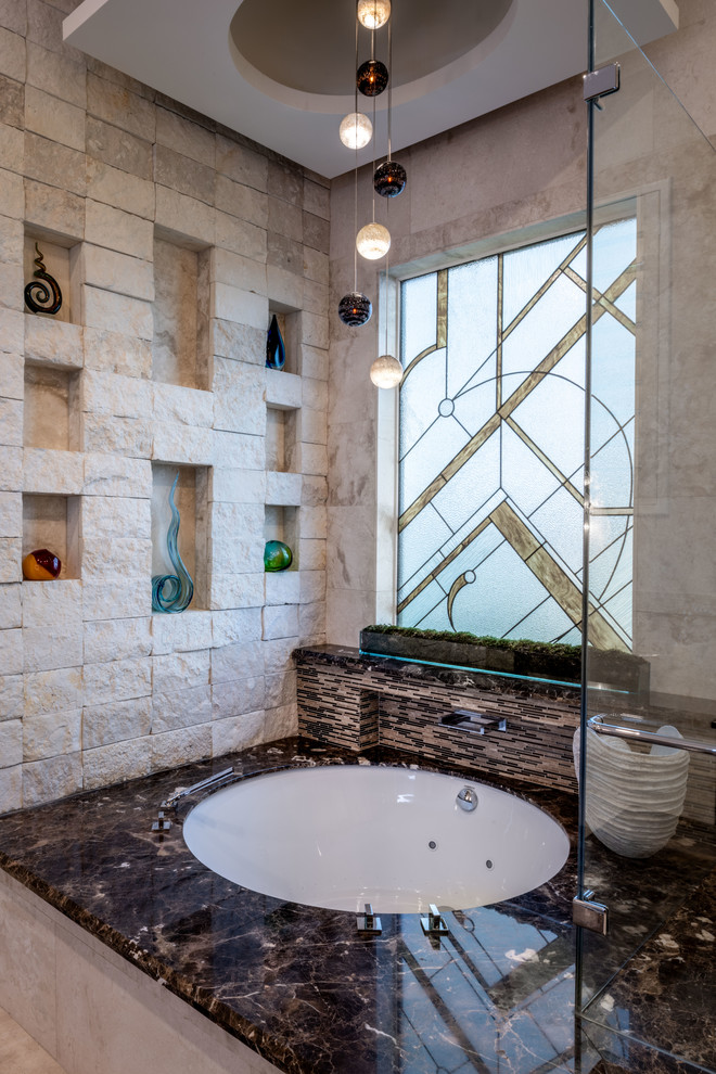 Bathroom - mid-sized mediterranean kids' beige tile and glass tile porcelain tile and white floor bathroom idea in Houston with raised-panel cabinets, white cabinets, a one-piece toilet, white walls, an undermount sink, quartzite countertops, a hinged shower door and white countertops