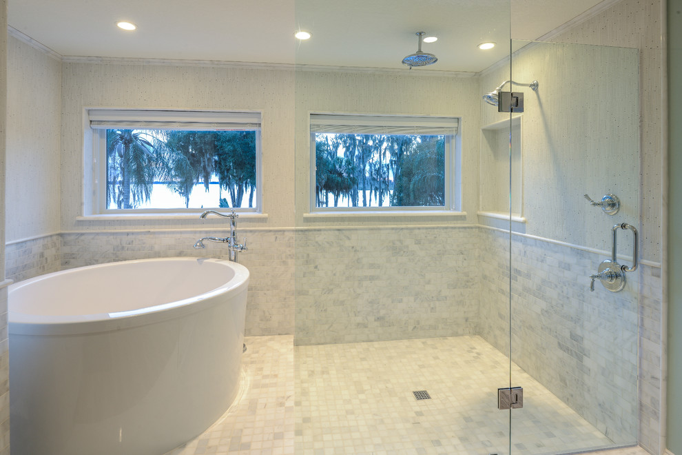Large transitional master marble floor japanese bathtub photo in Tampa