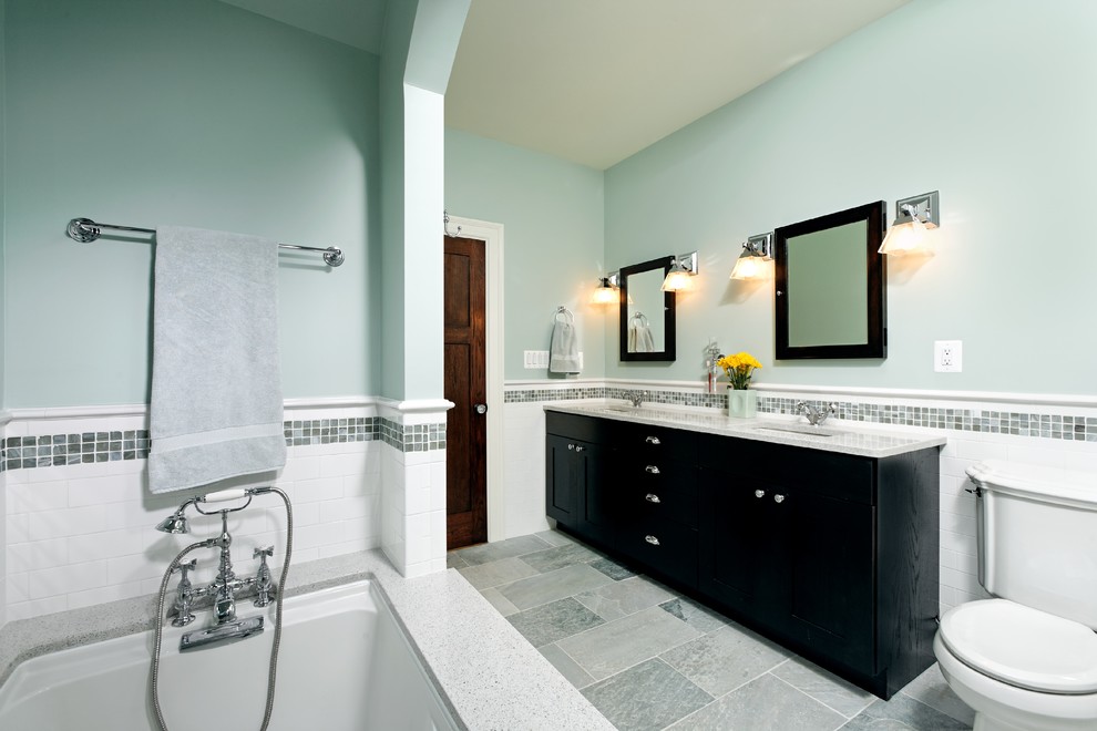 Example of a large tuscan master white tile and ceramic tile ceramic tile alcove bathtub design in DC Metro with an undermount sink, recessed-panel cabinets, dark wood cabinets, quartzite countertops, a two-piece toilet and green walls