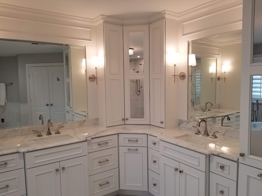 Example of a mid-sized classic master white tile and marble tile white floor bathroom design in DC Metro with raised-panel cabinets, white cabinets, a one-piece toilet, gray walls, a drop-in sink, granite countertops, a hinged shower door and white countertops
