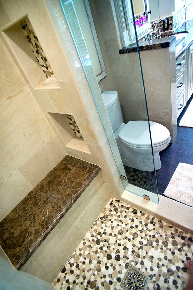 Bathroom - mid-sized traditional master brown tile and mosaic tile porcelain tile bathroom idea in Los Angeles with an undermount sink, raised-panel cabinets, beige cabinets, marble countertops, a one-piece toilet and beige walls