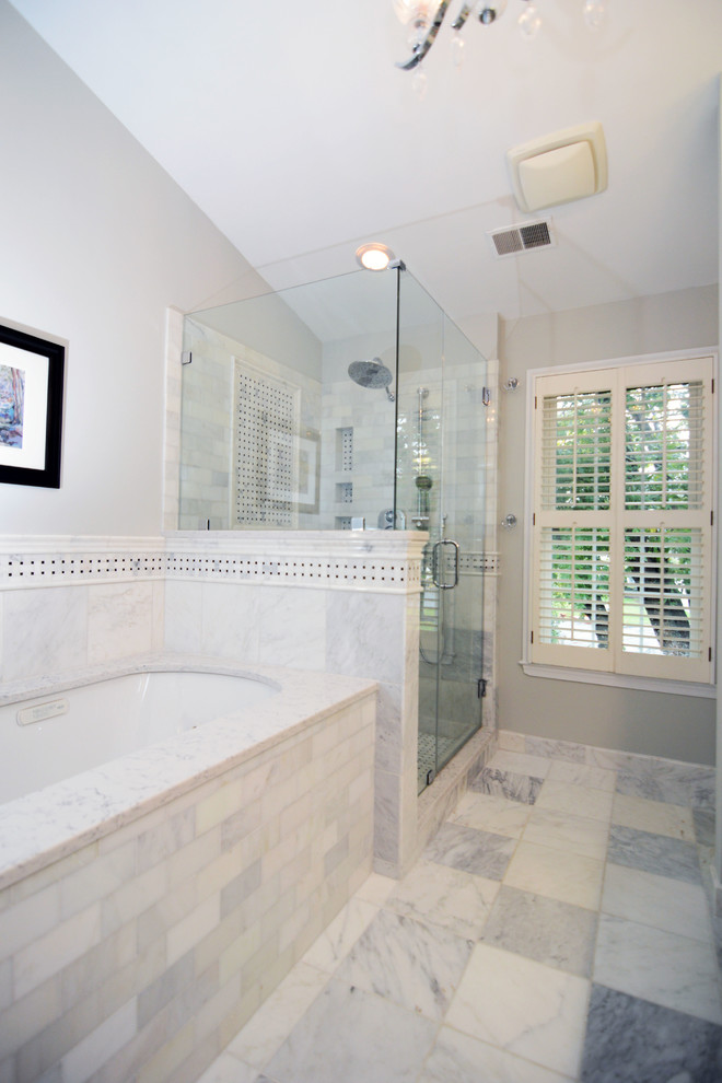 Example of a classic multicolored tile doorless shower design in DC Metro with an undermount sink, recessed-panel cabinets, white cabinets, quartz countertops and an undermount tub