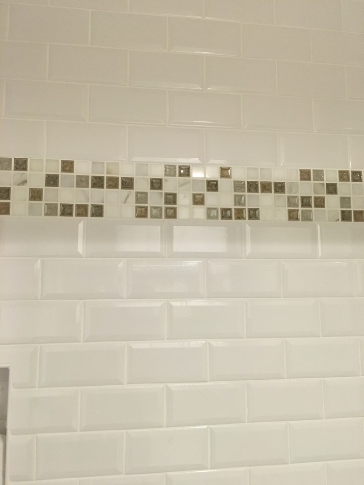 Elegant master white tile and ceramic tile porcelain tile bathroom photo in Sacramento